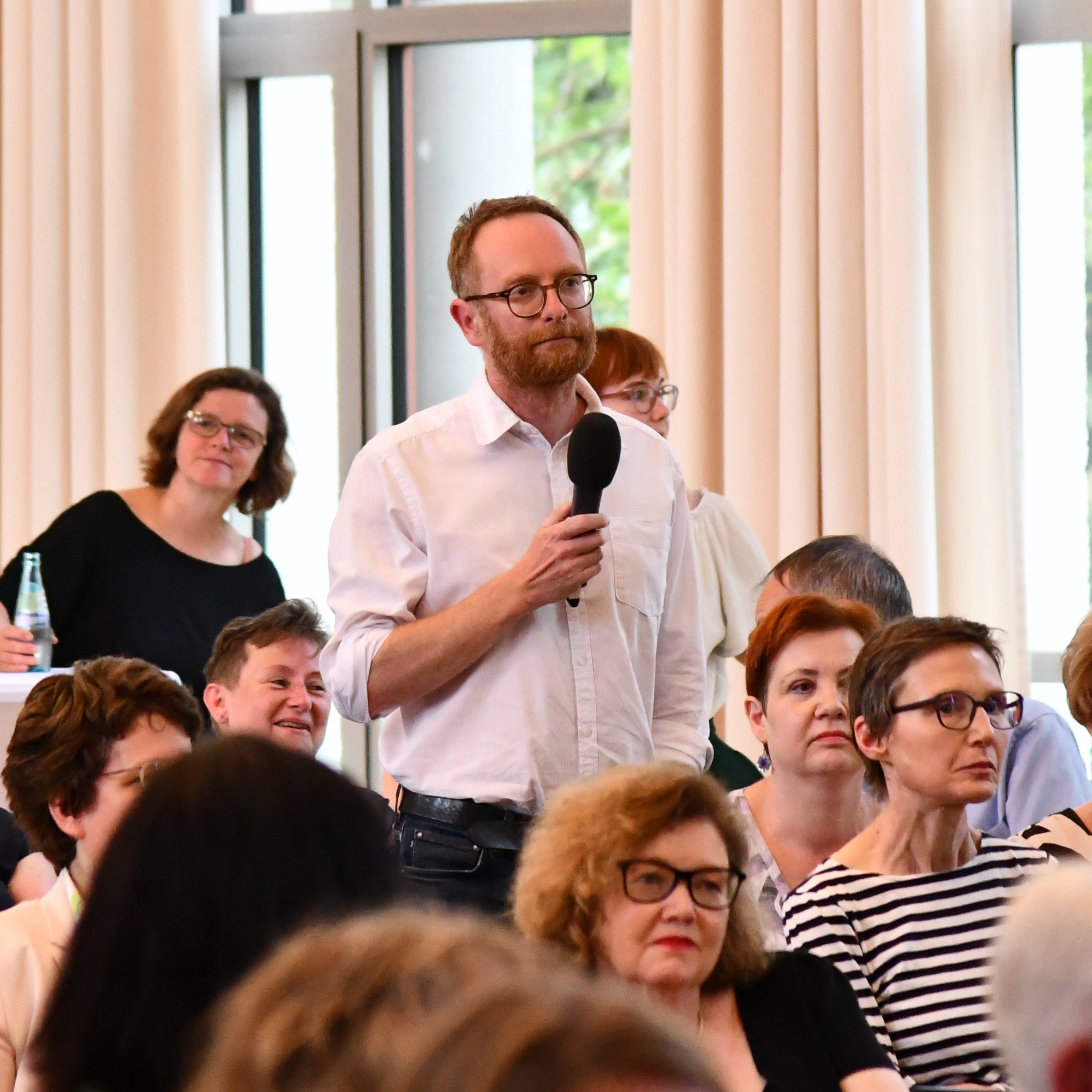 The audience during the discussion, which was part of the anniversary celebration.